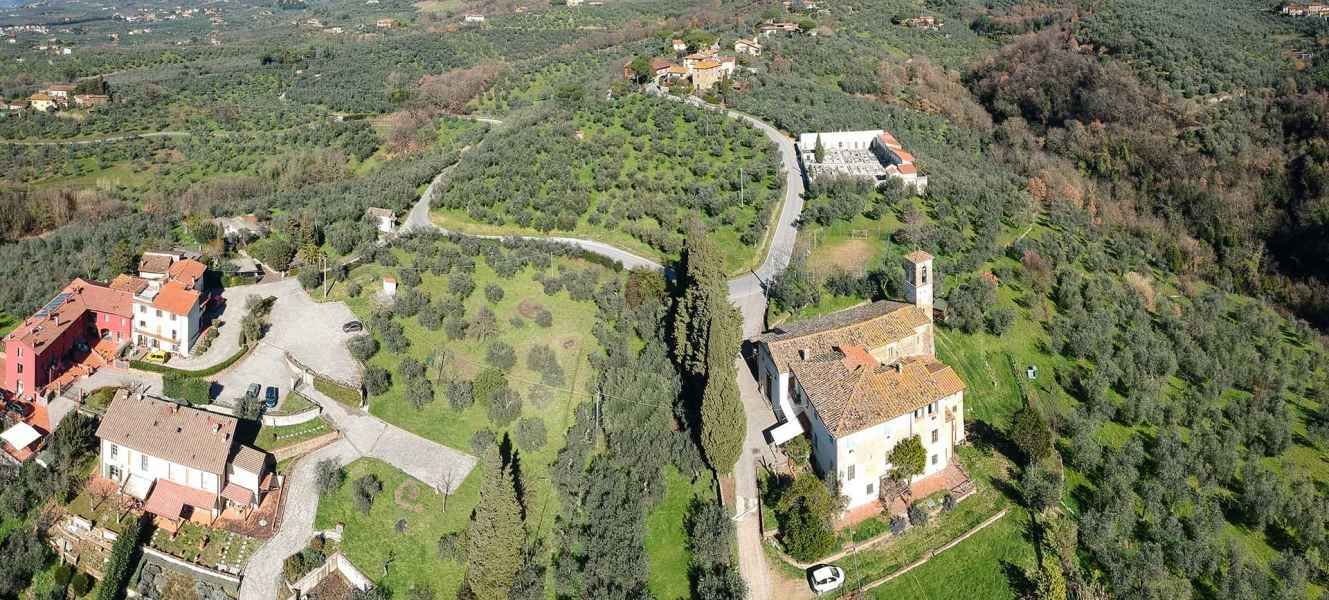 Panoramic view with the church of Santa Maria al Pruno in Orbignano, Carmignano