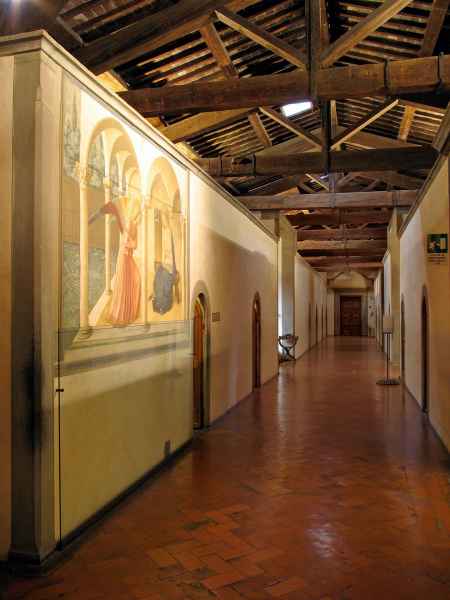 Corridor of the Convent of San Marco overlooked by the dormitory cells. On the left, the Annunciation by Beato Angelico. 